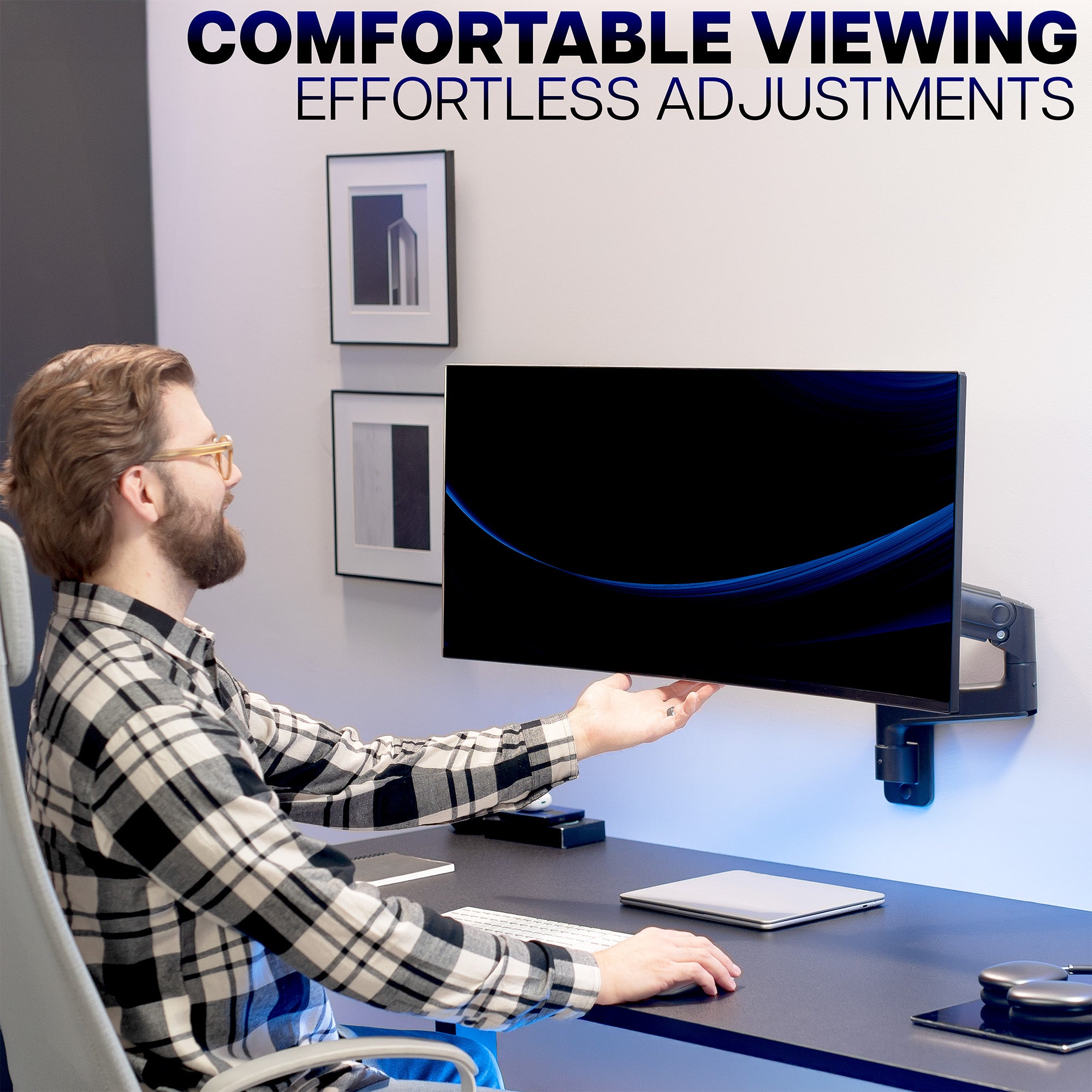 Man adjusting a computer monitor with text 'Comfortable Viewing' and 'Effortless Adjustments'.