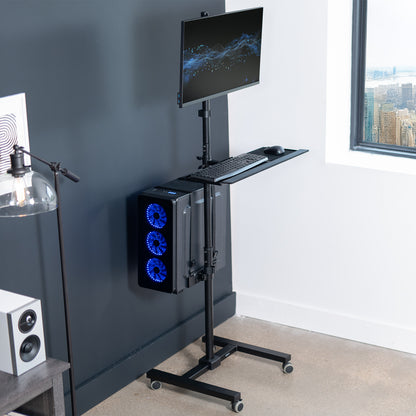 Mobile workstation cart with monitor mount, keyboard tray, PC holder, and locking wheels. Featuring 360 rotation and height adjustment.