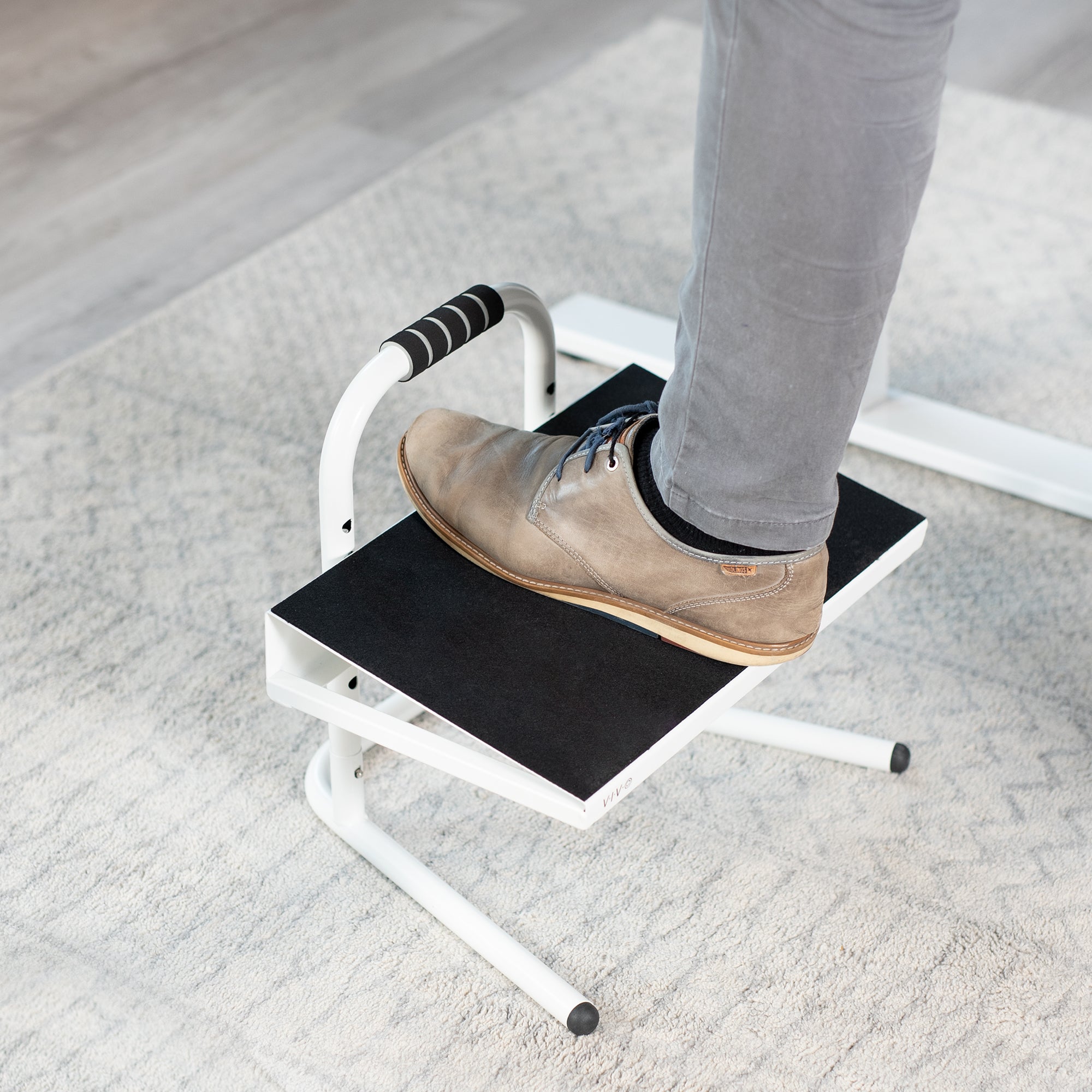 Adjustable footrest under desk sale