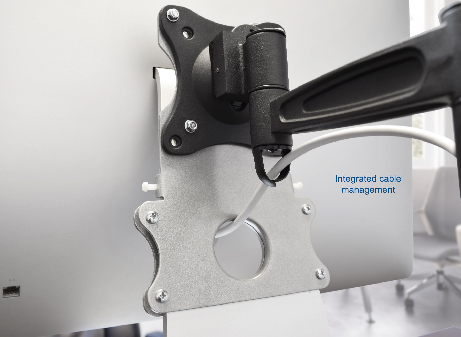 Metal Mac VESA plate adapter.