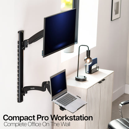 Compact Pro Workstation with monitor and laptop on a white wall.