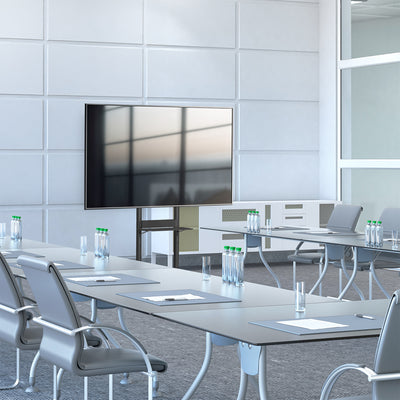 Mobile TV mount cart with media shelf and locking wheels. Stand features height adjustment, articulation, and a built-in cable management system.