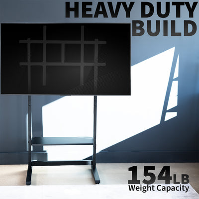 Large flat-screen TV on a heavy duty floor stand with construction features highlighted. 