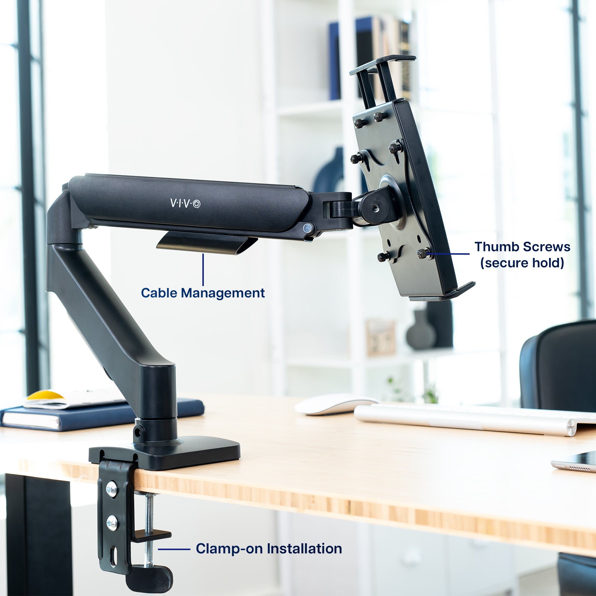 Single Mechanical Arm Desk Mount for Tablets, 2-in-1 Laptops, Portable Monitors showcasing features on a desk in bright office space.