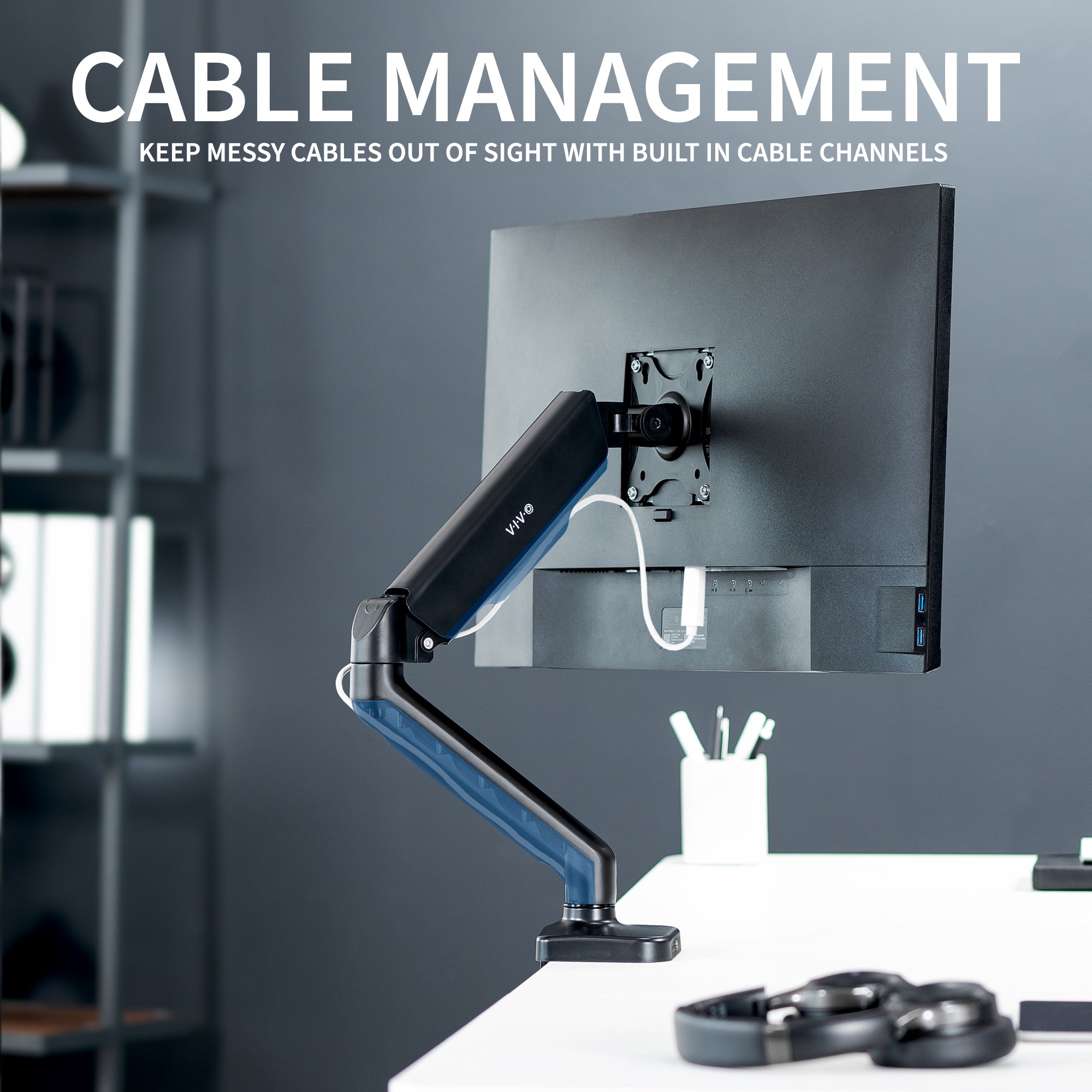 Sturdy clamp-on pneumatic arm single monitor desk mount with USB ports and audio ports, articulation, height adjustment, and cable management.