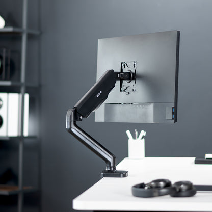 Sturdy clamp-on mechanical arm single monitor desk mount with articulation, height adjustment, and cable management.