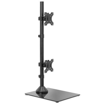 Tall dual monitor desk stand for stacked array with sturdy glass base.