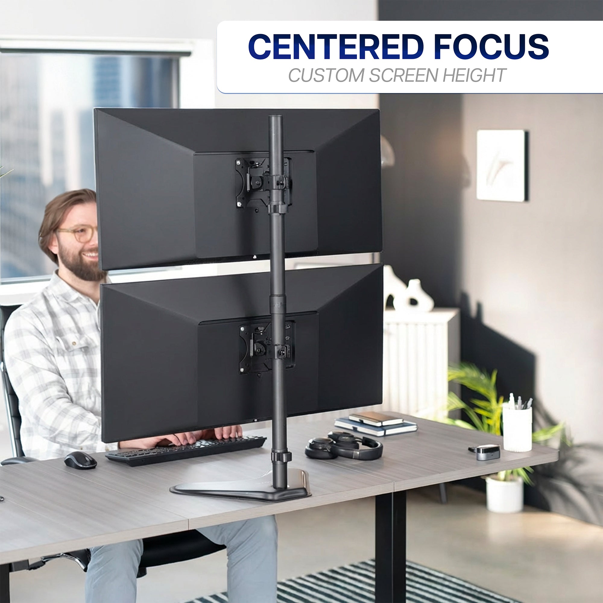 Person using a dual monitor setup on a desk with 'Centered Focus' text above.
