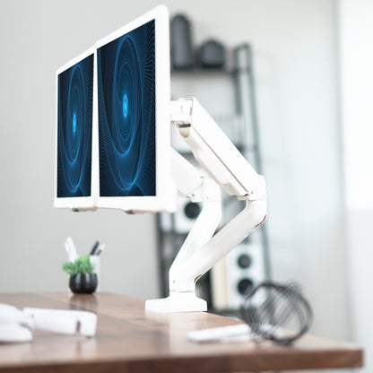 Sturdy adjustable mechanical arm dual monitor ergonomic desk stand for office workstation.