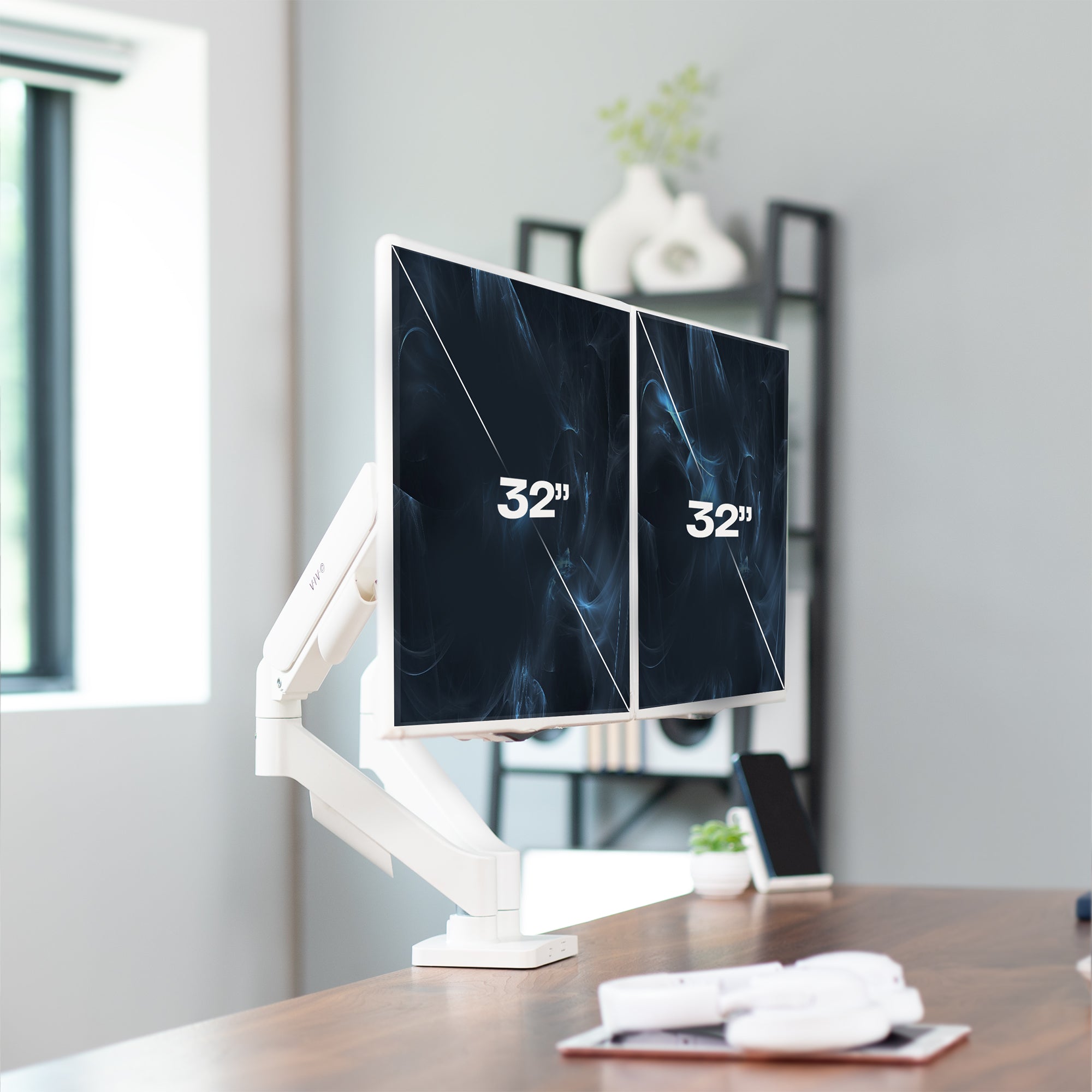 Sturdy adjustable mechanical arm dual monitor ergonomic desk stand for office workstation.