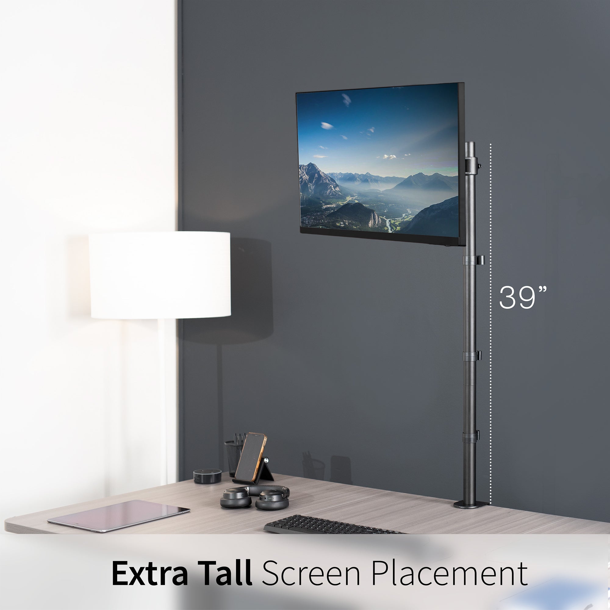 Extra tall desk mount for single monitor provides sit or stand application for the user, flexible viewing angles, and tall screen placement.