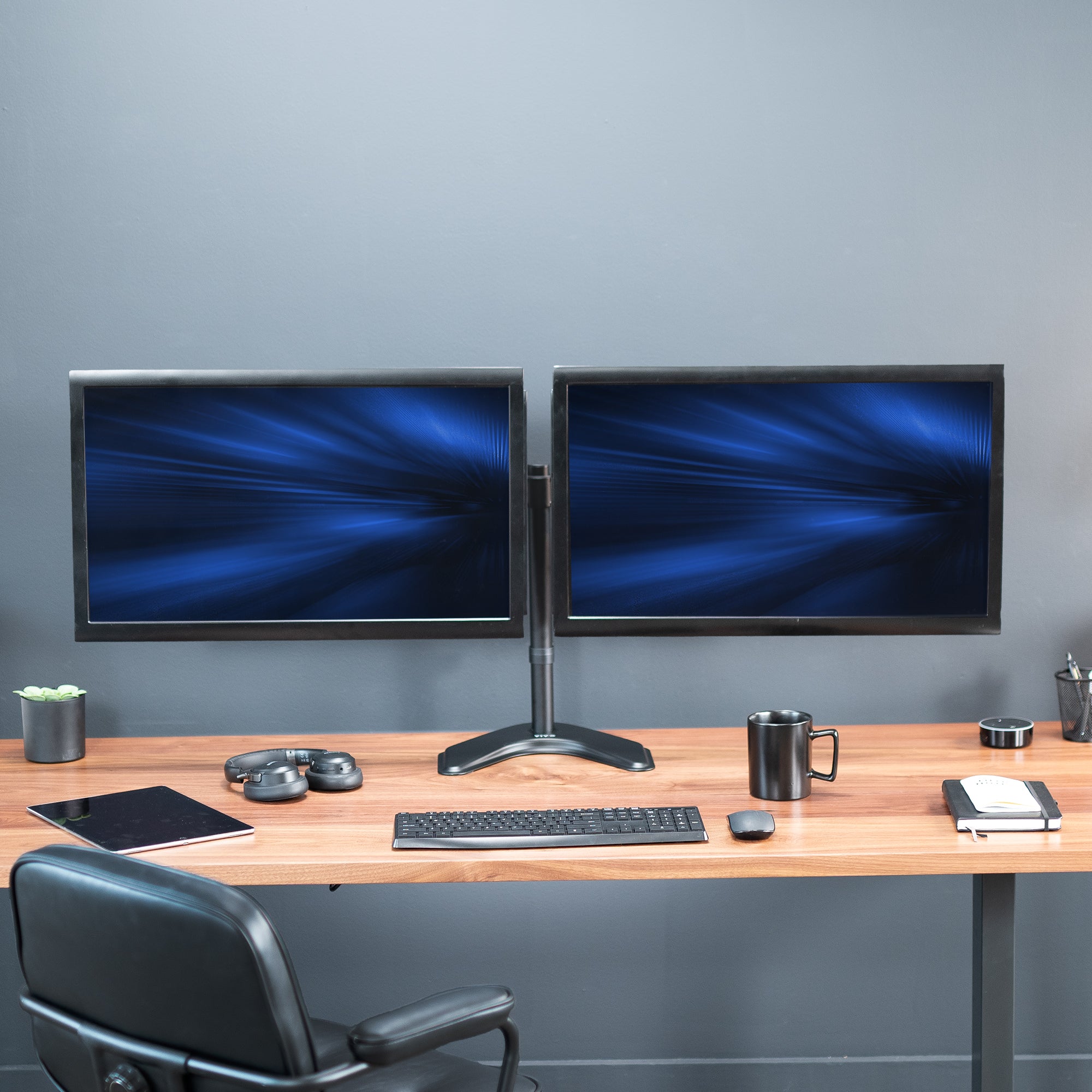 Enjoy ergonomic viewing angles with our freestanding dual monitor stand. 