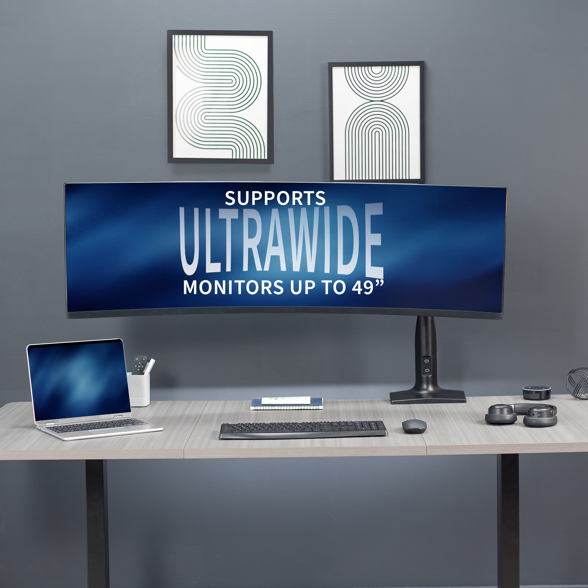 Sturdy adjustable pneumatic arm single ultrawide monitor ergonomic desk mount with USB ports for office workstation.