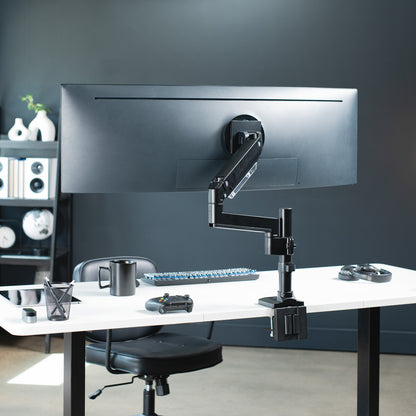 Sturdy adjustable pneumatic arm single ultrawide monitor ergonomic desk mount with USB ports for office workstation.