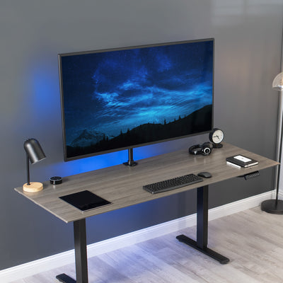 Sturdy wide screen TV desk mount with height adjustment and articulation.
