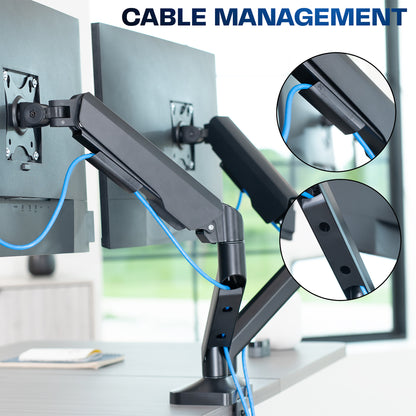 Monitor arm with cable management feature on a desk setup.