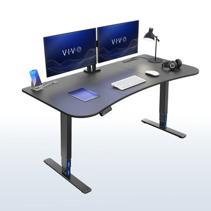 63” x 32” Electric Height Adjustable Stand Up Desk. Features a built-in power strip.