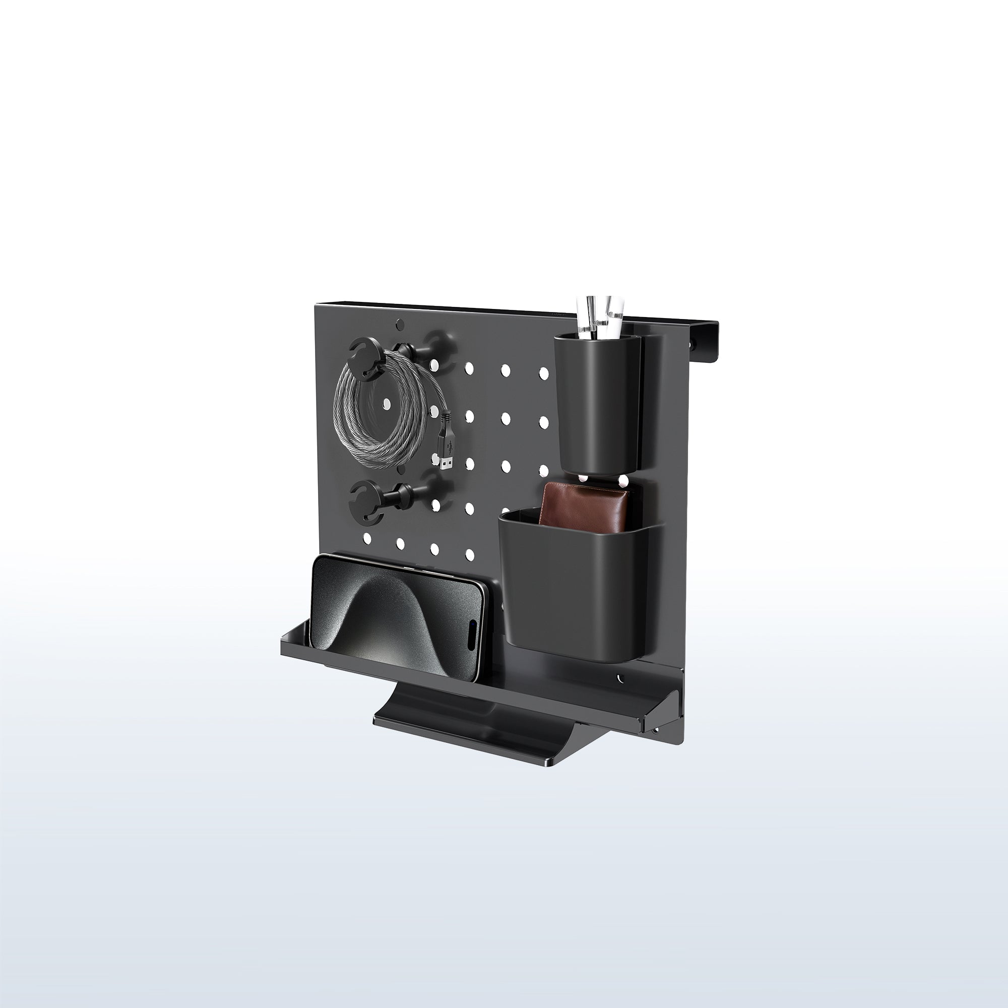 A black pegboard desk organizer with various slots and holders for office supplies and a mobile phone.