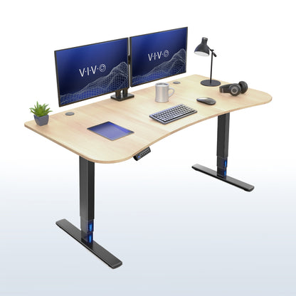 63” x 32” Electric Height Adjustable Stand Up Desk. Features a built-in power strip.