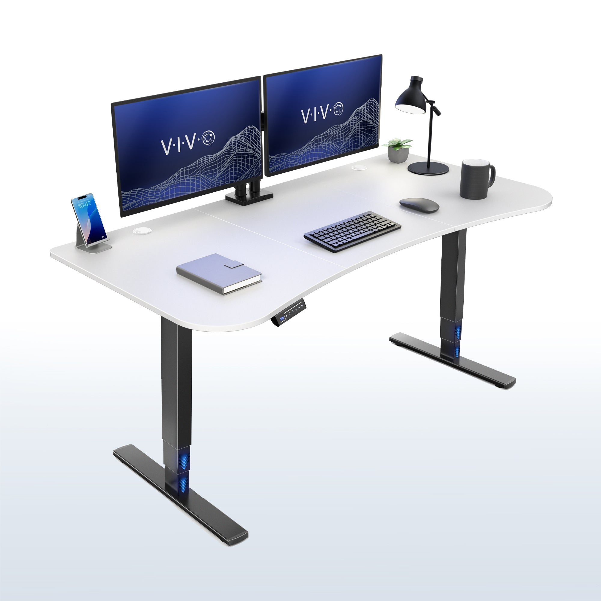 63” x 32” Electric Height Adjustable Stand Up Desk. Features a built-in power strip.
