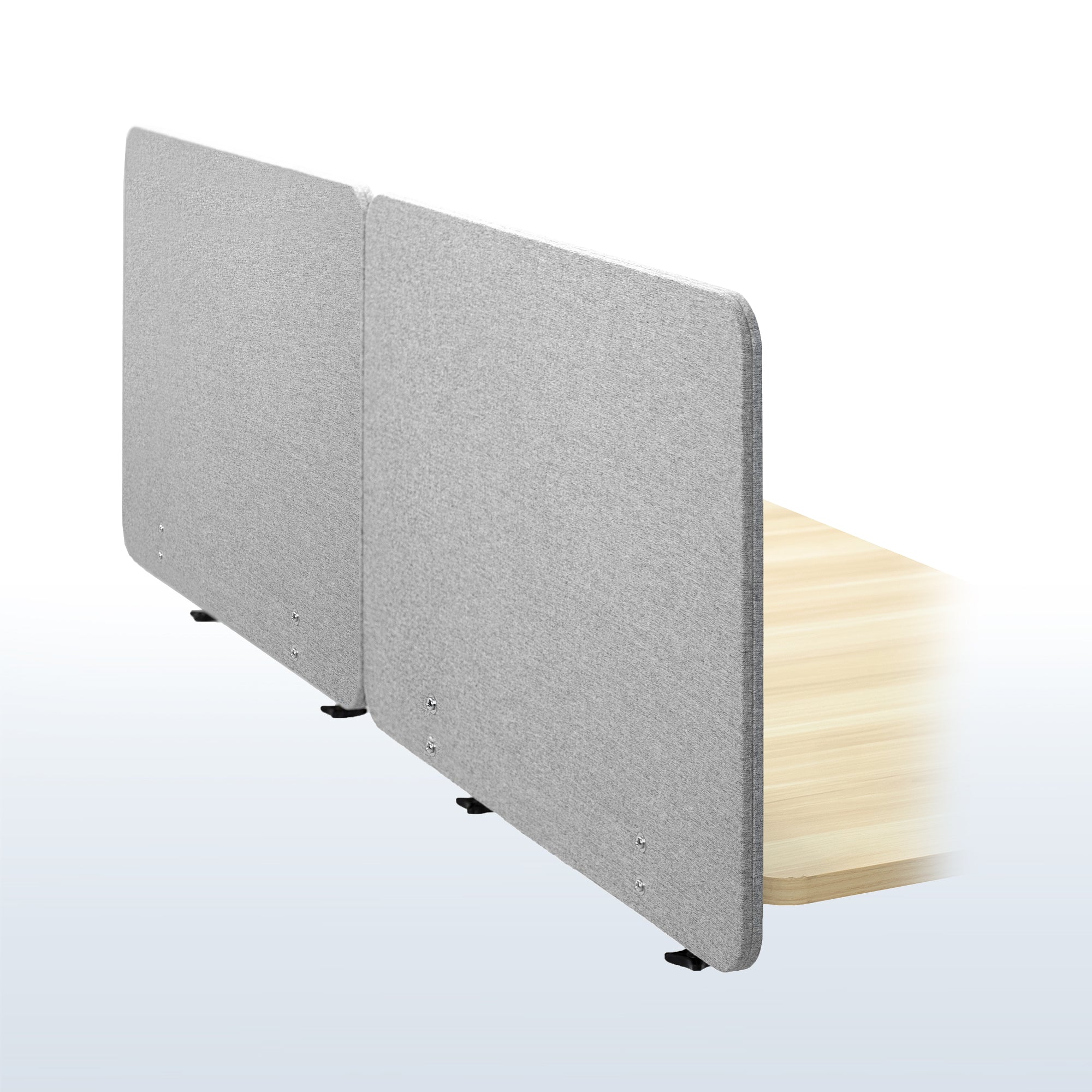 Clamp-on desk privacy panel for office workspace.