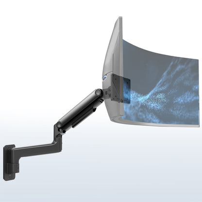 A single ultrawide computer monitor attached to a pneumatic arm wall mount, with the arm extended to the side.
