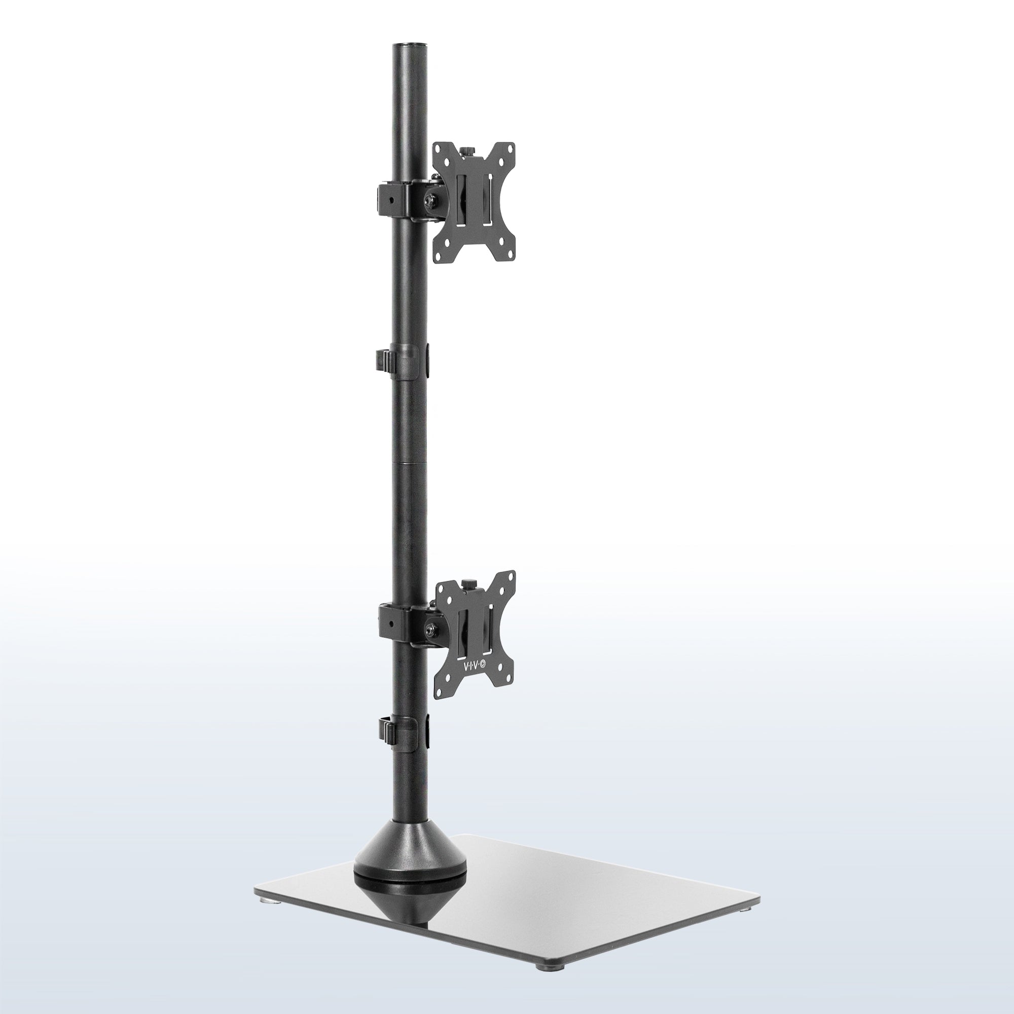 Tall dual monitor desk stand for stacked array with sturdy glass base.