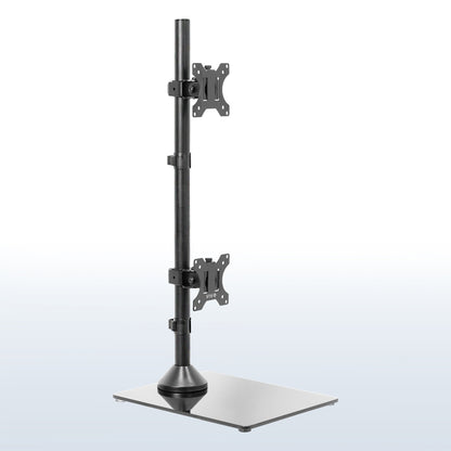 Tall dual monitor desk stand for stacked array with sturdy glass base.