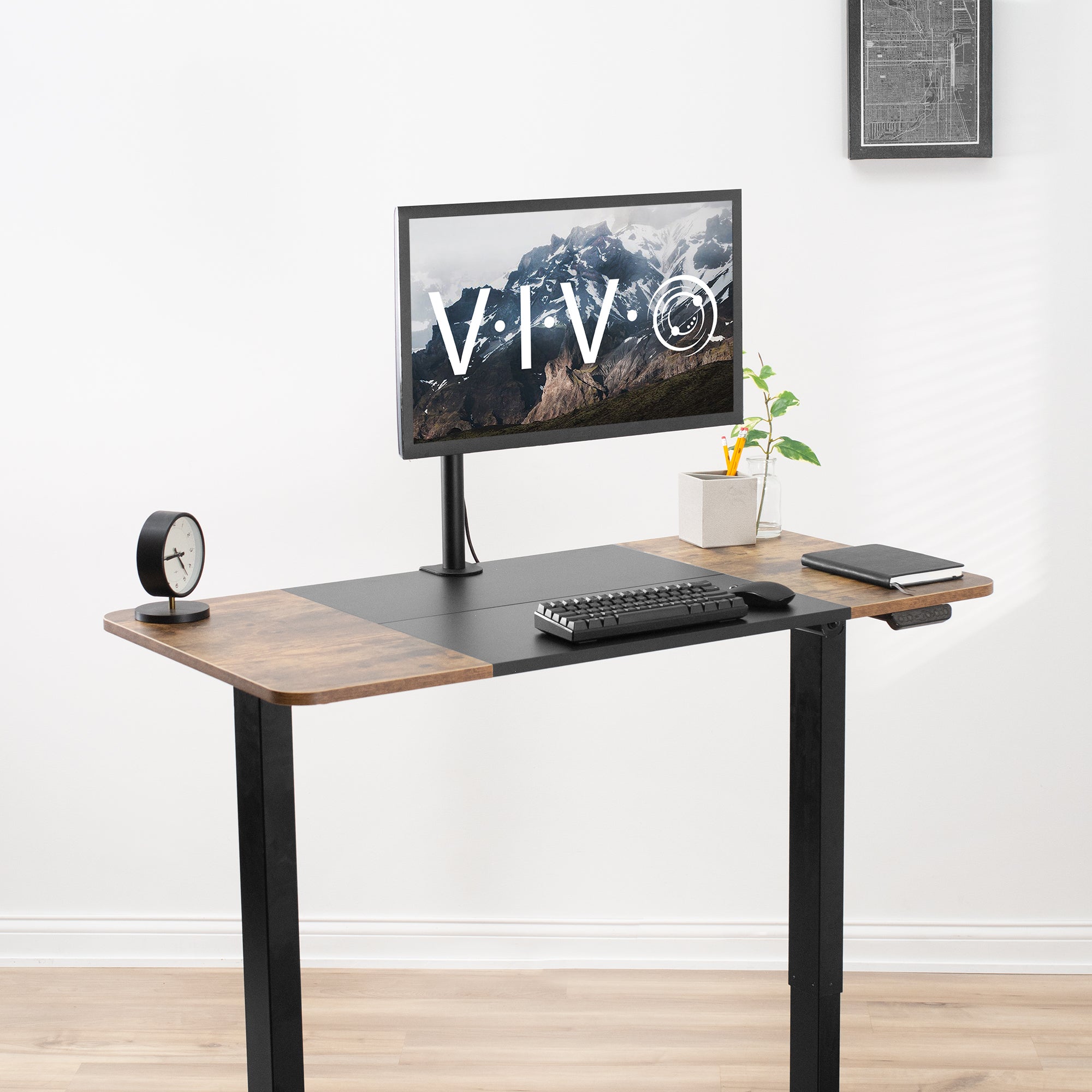 Sturdy rustic electric sit or stand desk workstation with adjustable height.