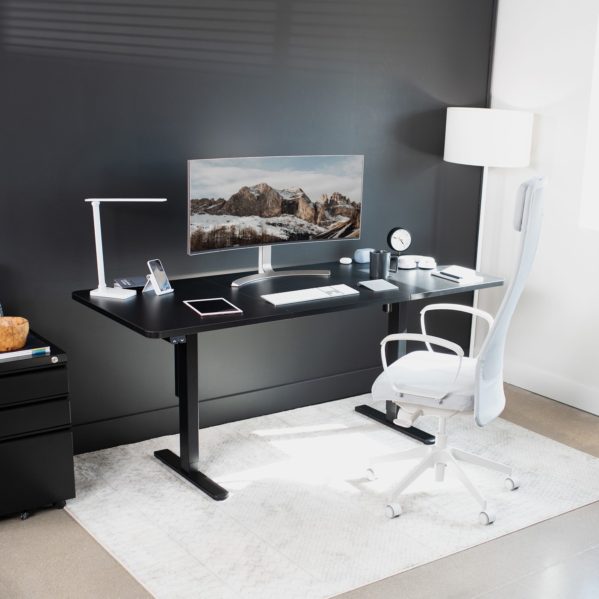 Wide surface sturdy sit or stand active workstation with adjustable height using 2 button control panel.