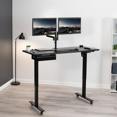 Heavy duty desk with under-drawer mount and top-of-desk dual monitor mount.