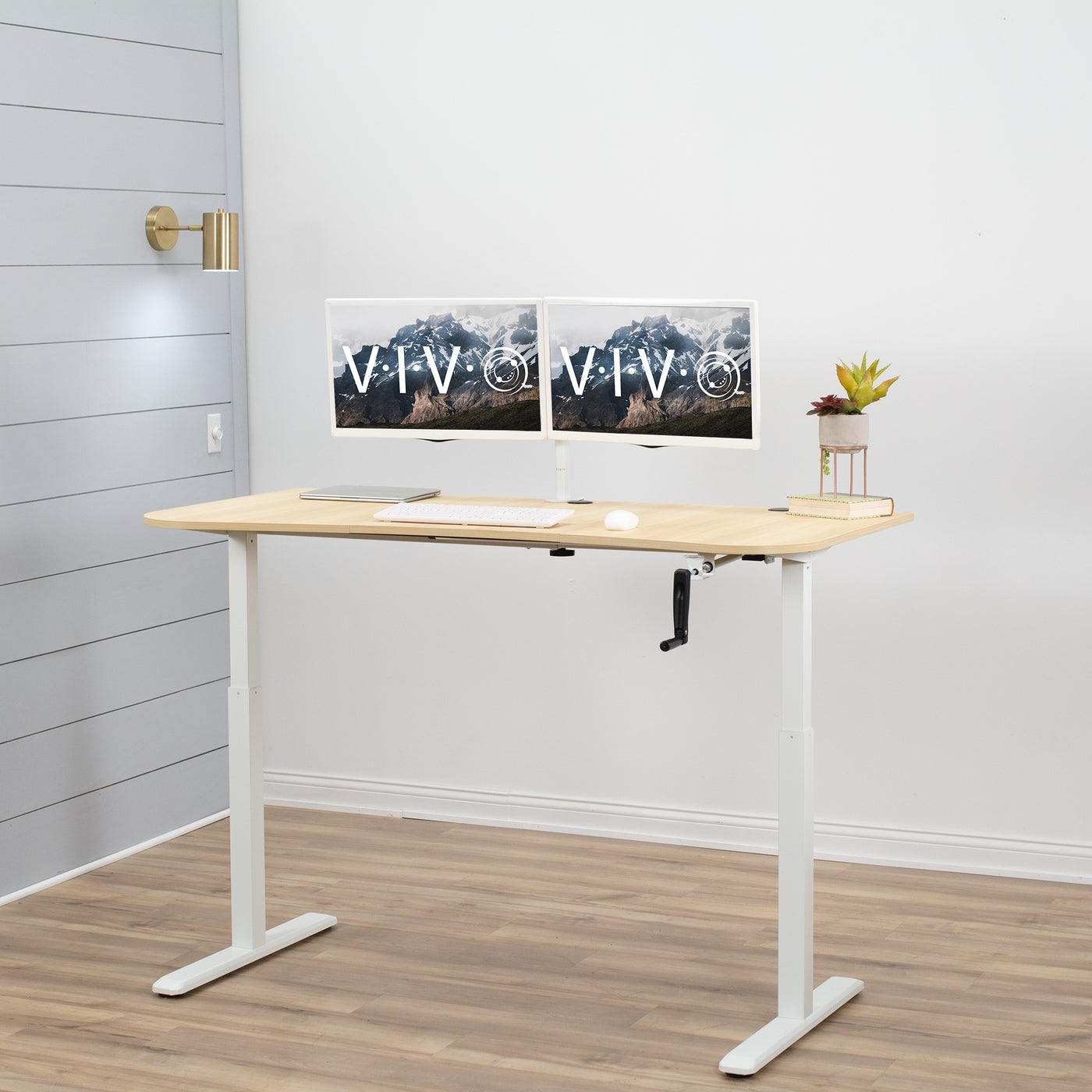 Sturdy manual hand crank height adjustable desk for sit or stand workstation.