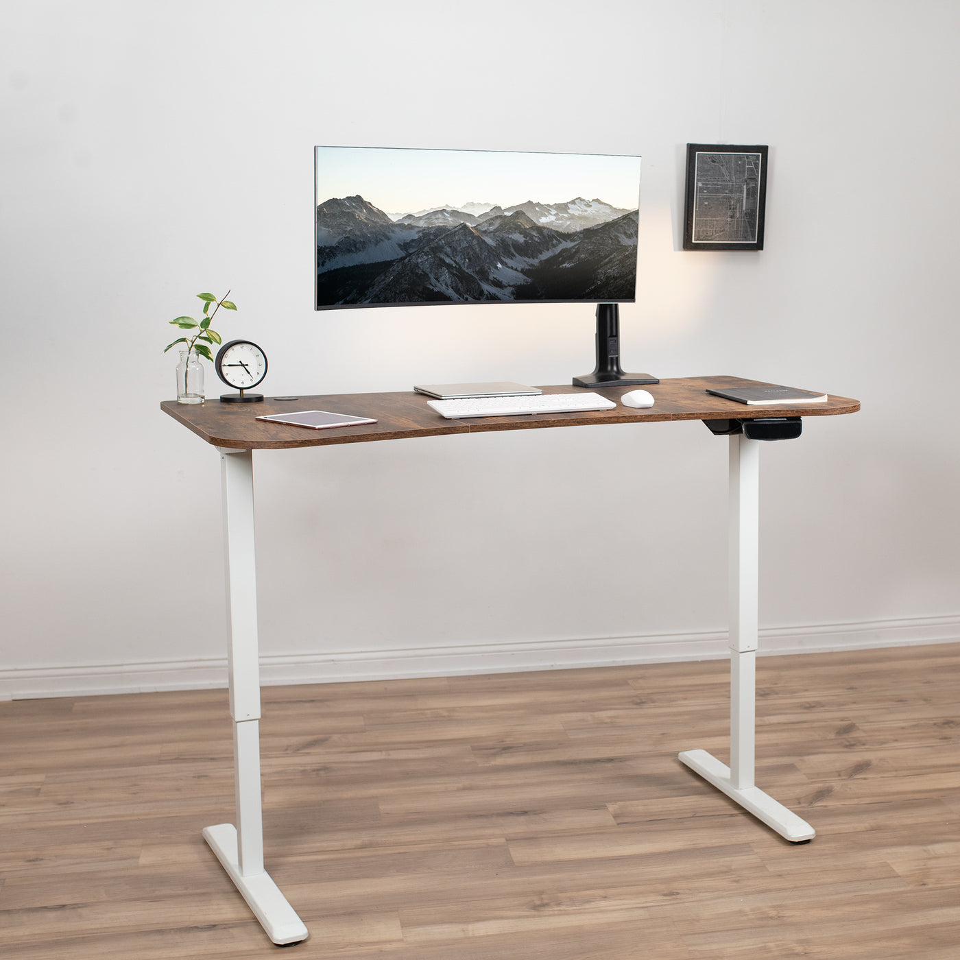 Rustic ergonomic sit or stand active workstation with adjustable height using touch screen control panel.