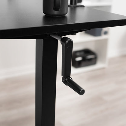 Side manual desk frame adjustment.