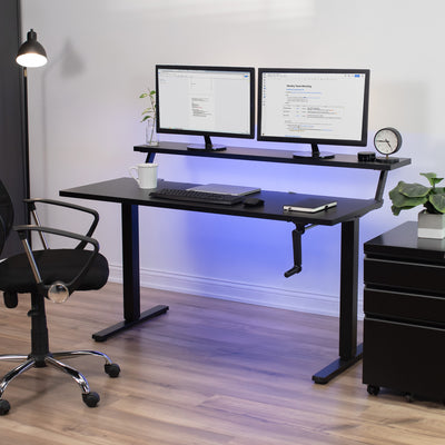 Manual height adjustable desk with split top elevating monitors to comfortable viewing angles.