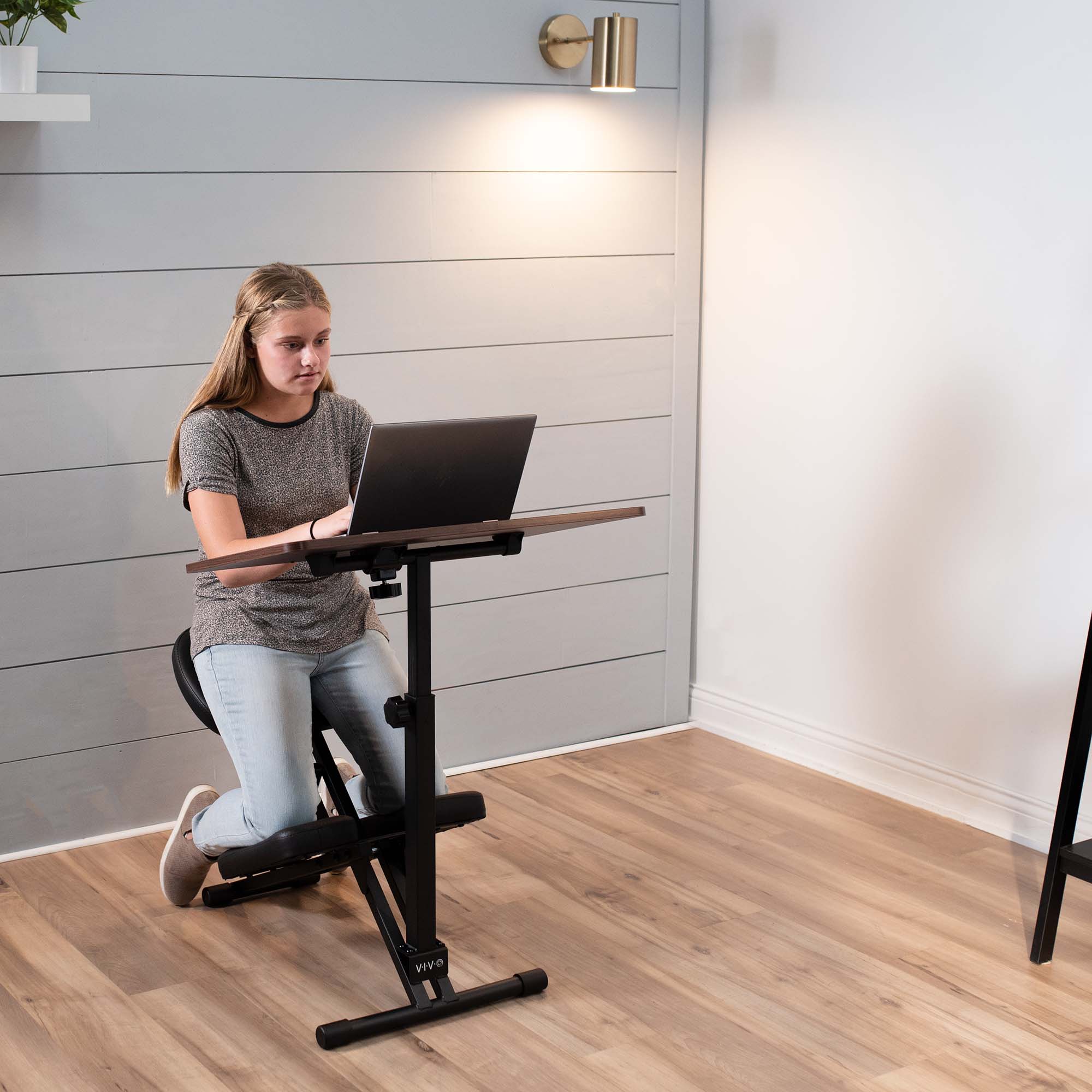 Comfortable kneeling chair desk for home classroom studying.