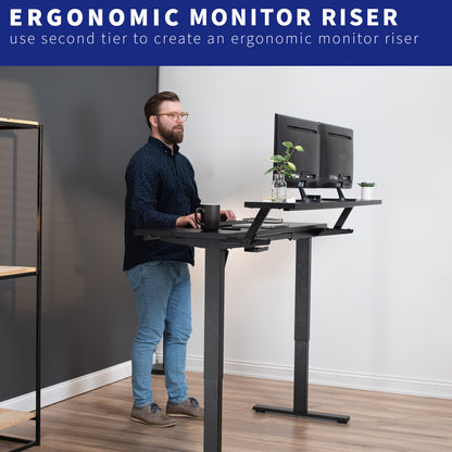 Heavy-duty adjustable sit or stand dual tier ergonomic office desk workstation.