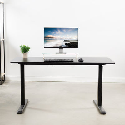 Modern office desk with black 60” desktop.