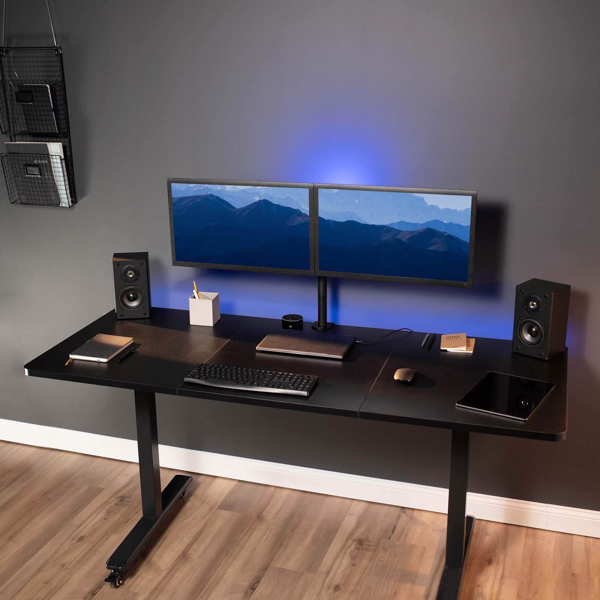 Triple panel desktop that runs flush on a modern desk frame.