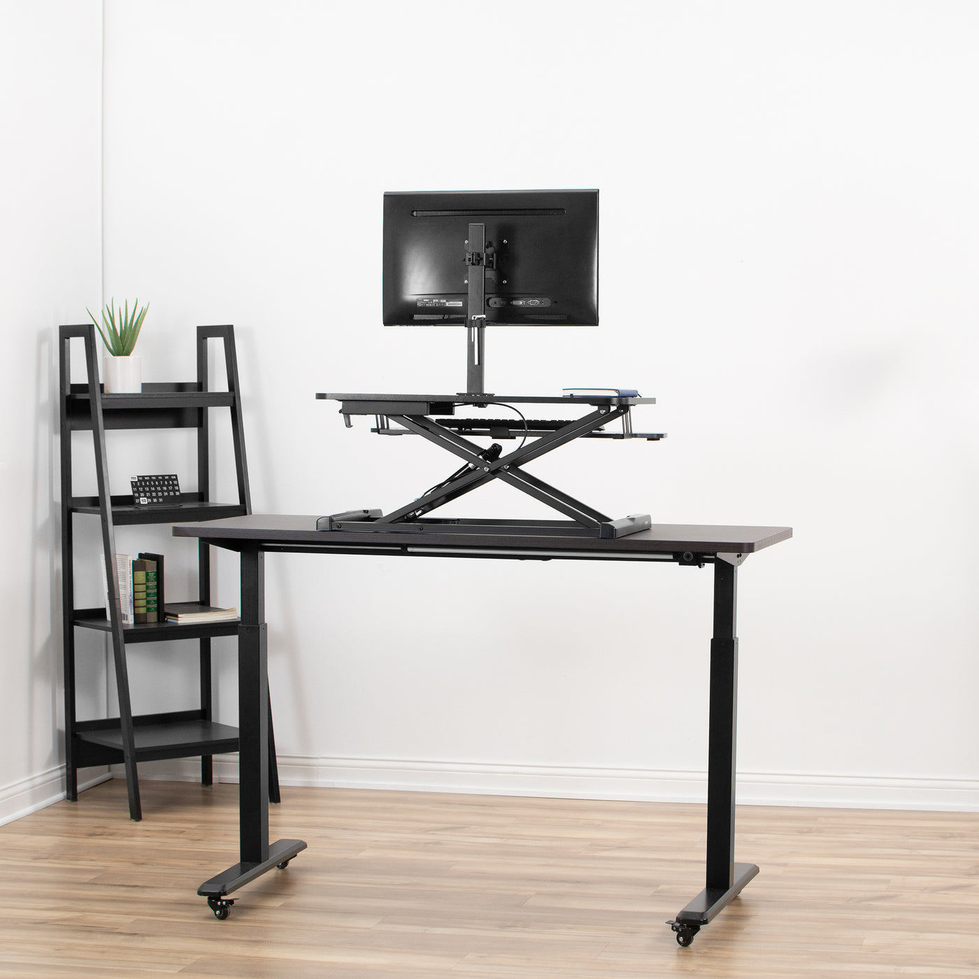 Sturdy X-frame support of the desk converter will securely support your office equipment.