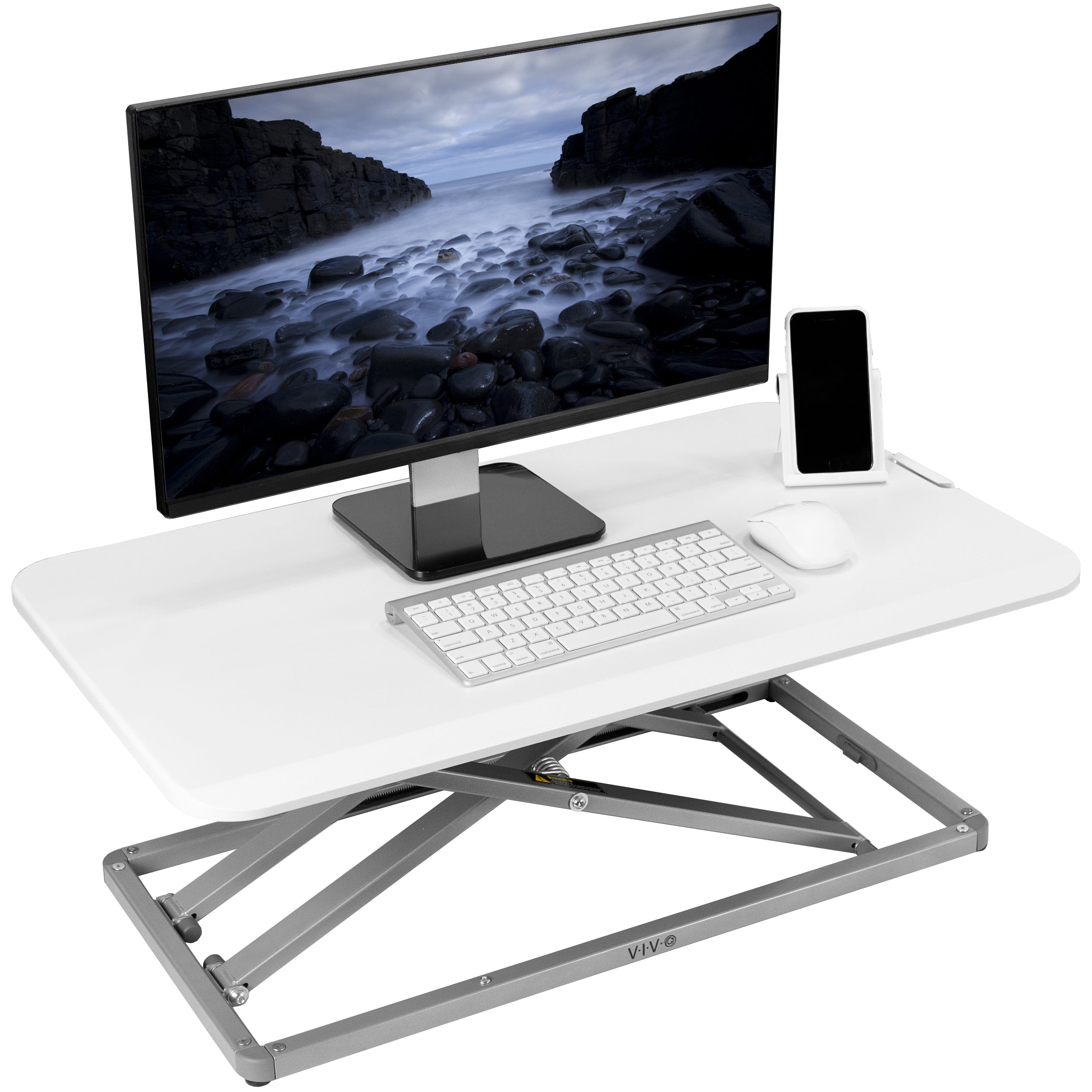 Heavy-duty height adjustable desk converter monitor riser.