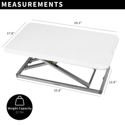 Heavy-duty height adjustable desk converter monitor riser.