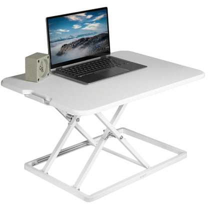 Heavy-duty height adjustable desk converter monitor riser.