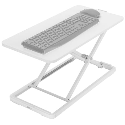 Sturdy height adjustable desk converter keyboard riser.