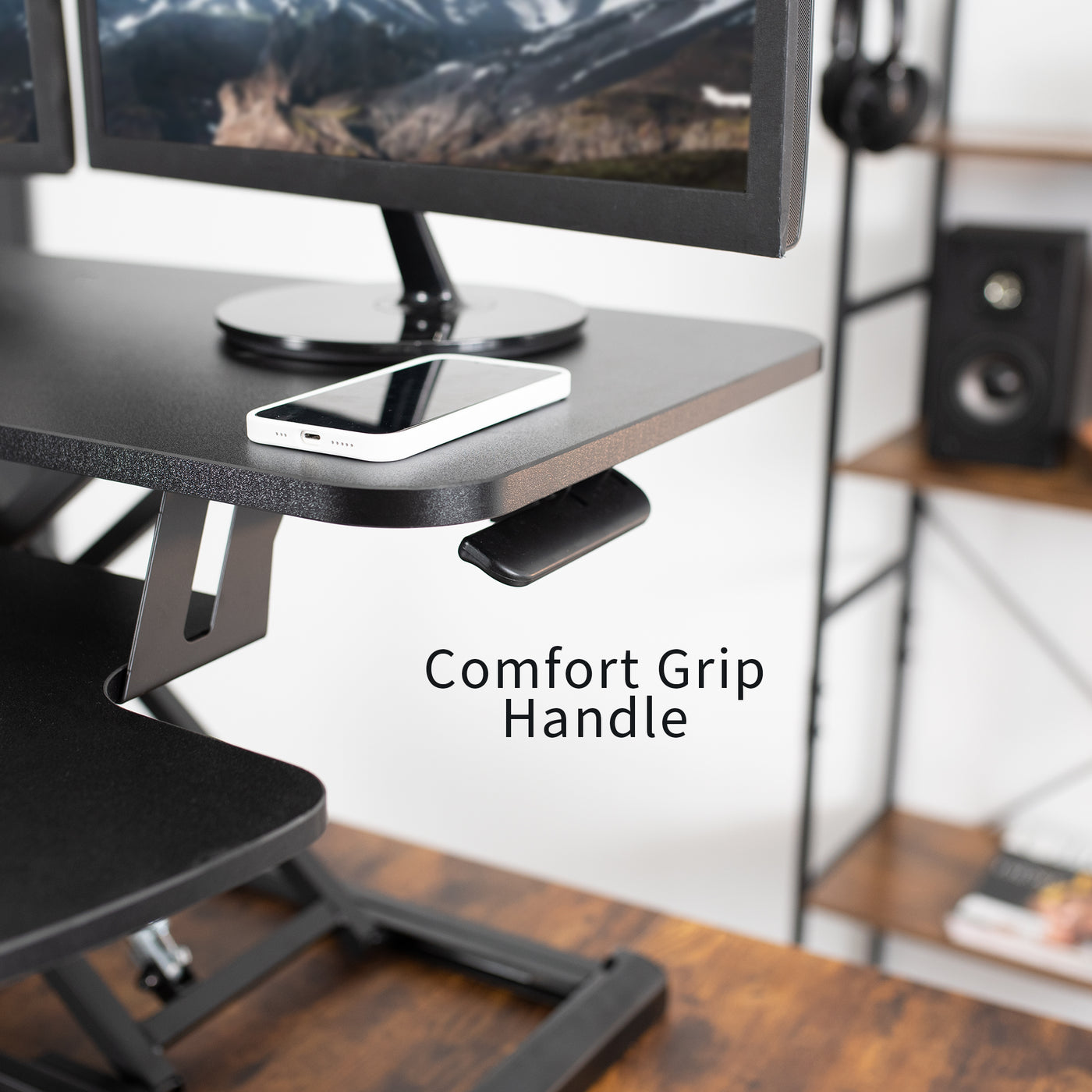 Comfort grip lever to raise and lower the desk converter.