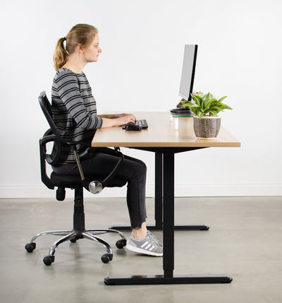 Comfortable working while sitting at a sit-to-stand desk. 