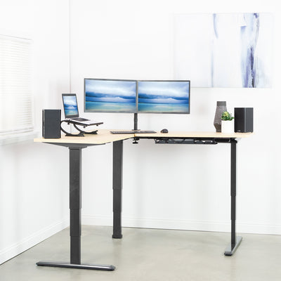 Large L-shaped desk in a modern minimalist room.