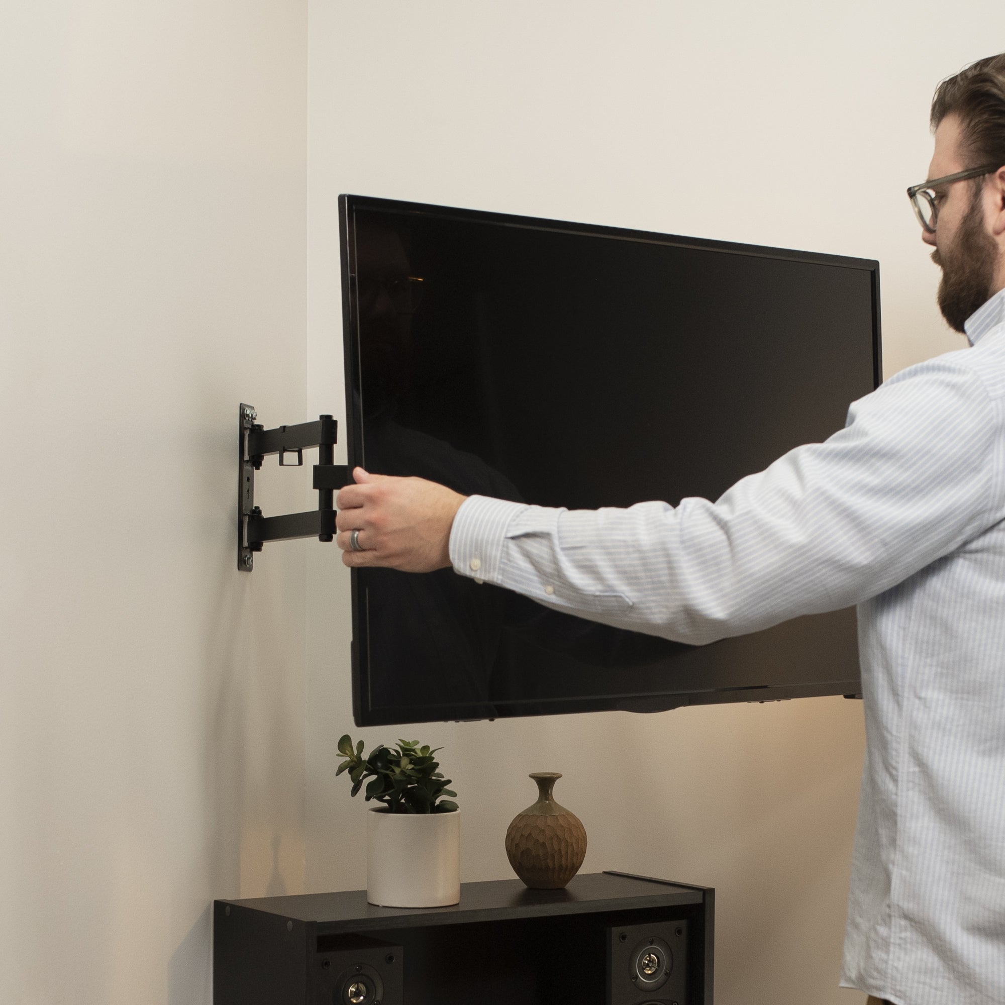 Sturdy corner wall mount for TV.