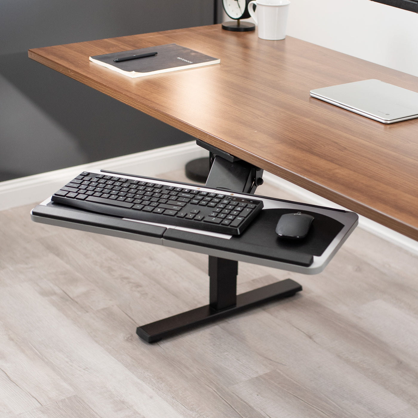 Ergonomic adjustable keyboard tray that mounts to the underside of your desk