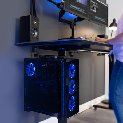 Clamp-on PC mount secures to desk legs for convenient placement.